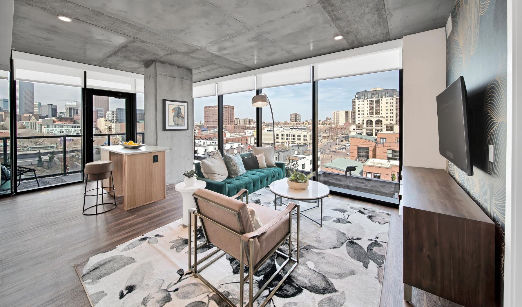 a living room with large windows