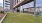 a building with an exercise lawn outside